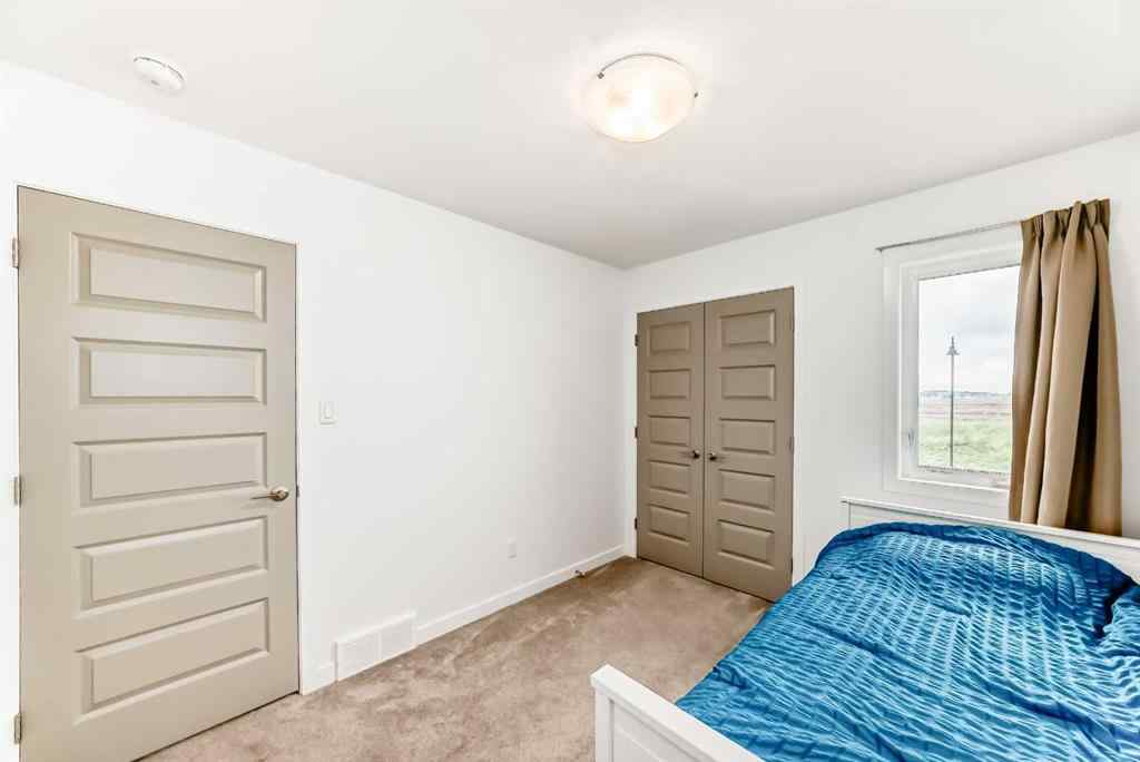 MLS® A2240913 - 673 Aquitania Boulevard W in Garry Station Lethbridge, Residential