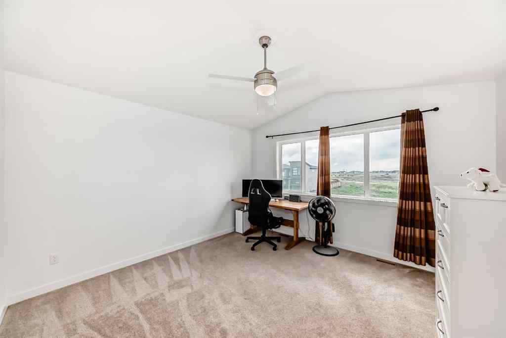 MLS® A2240913 - 673 Aquitania Boulevard W in Garry Station Lethbridge, Residential