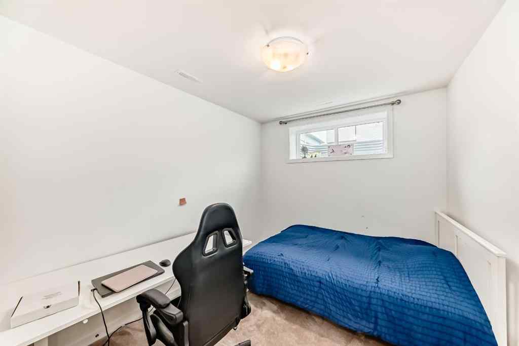 MLS® A2240913 - 673 Aquitania Boulevard W in Garry Station Lethbridge, Residential
