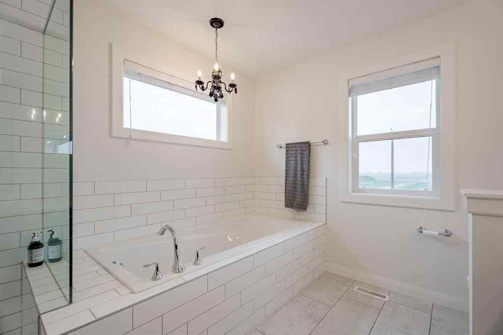 MLS® A2240957 - 2148 Ravensdun Crescent SE in Ravenswood Airdrie, Residential