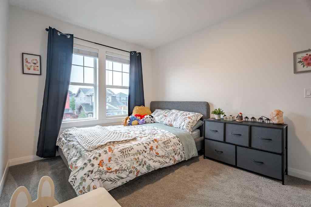 MLS® A2240957 - 2148 Ravensdun Crescent SE in Ravenswood Airdrie, Residential