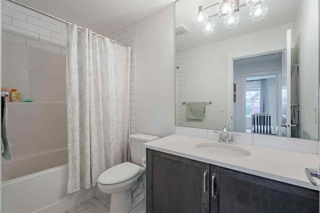 MLS® A2240957 - 2148 Ravensdun Crescent SE in Ravenswood Airdrie, Residential