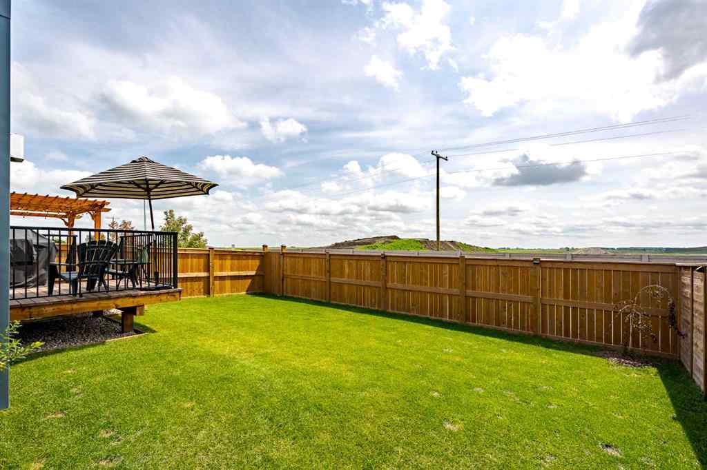 MLS® A2240957 - 2148 Ravensdun Crescent SE in Ravenswood Airdrie, Residential