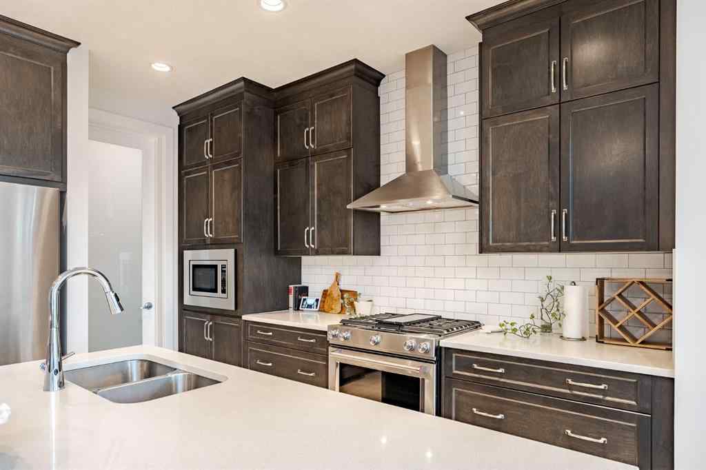 MLS® A2240957 - 2148 Ravensdun Crescent SE in Ravenswood Airdrie, Residential