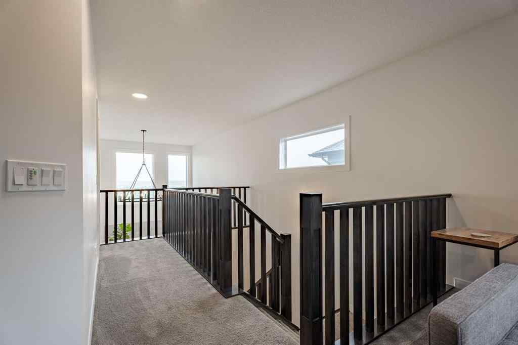 MLS® A2240957 - 2148 Ravensdun Crescent SE in Ravenswood Airdrie, Residential