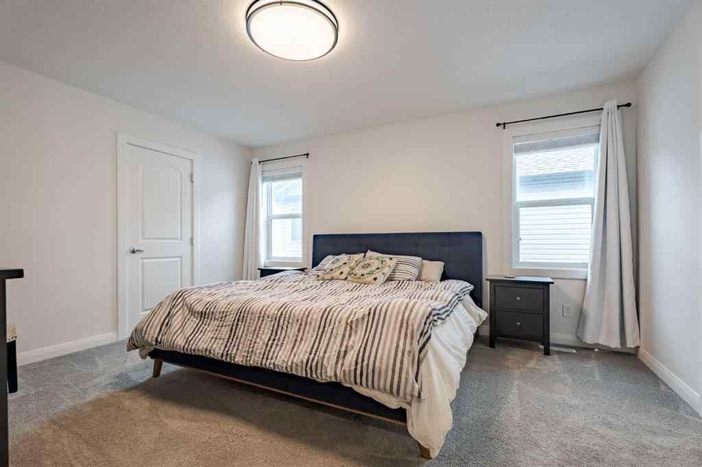 MLS® A2240957 - 2148 Ravensdun Crescent SE in Ravenswood Airdrie, Residential