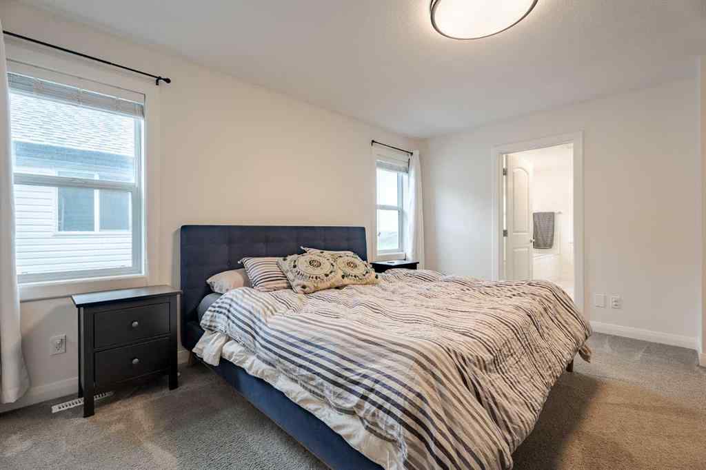 MLS® A2240957 - 2148 Ravensdun Crescent SE in Ravenswood Airdrie, Residential