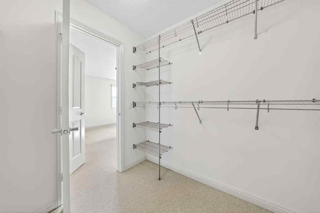 MLS® A2240997 - 320 Everbrook Way SW in Evergreen Calgary, Residential