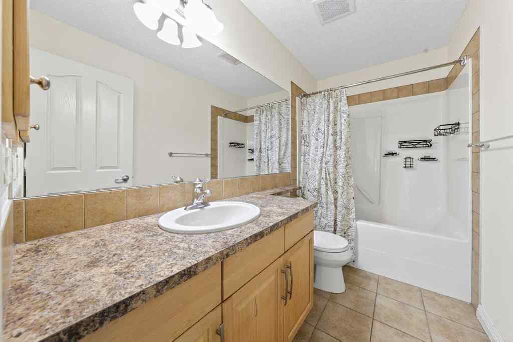 MLS® A2240997 - 320 Everbrook Way SW in Evergreen Calgary, Residential