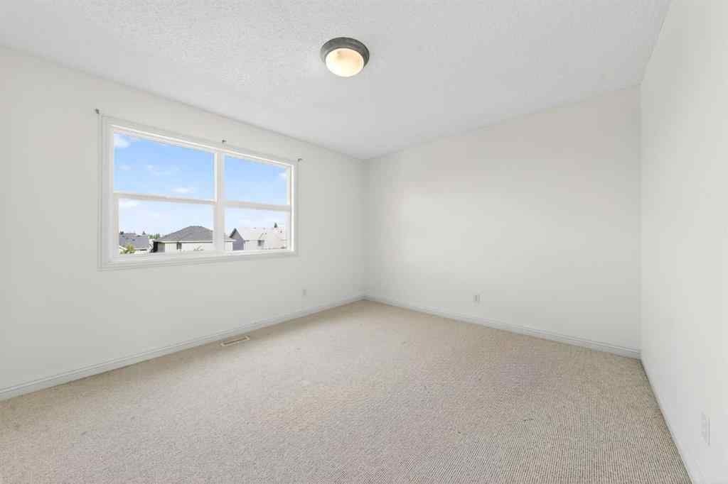 MLS® A2240997 - 320 Everbrook Way SW in Evergreen Calgary, Residential