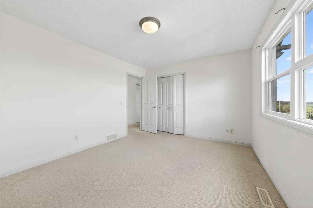 MLS® A2240997 - 320 Everbrook Way SW in Evergreen Calgary, Residential