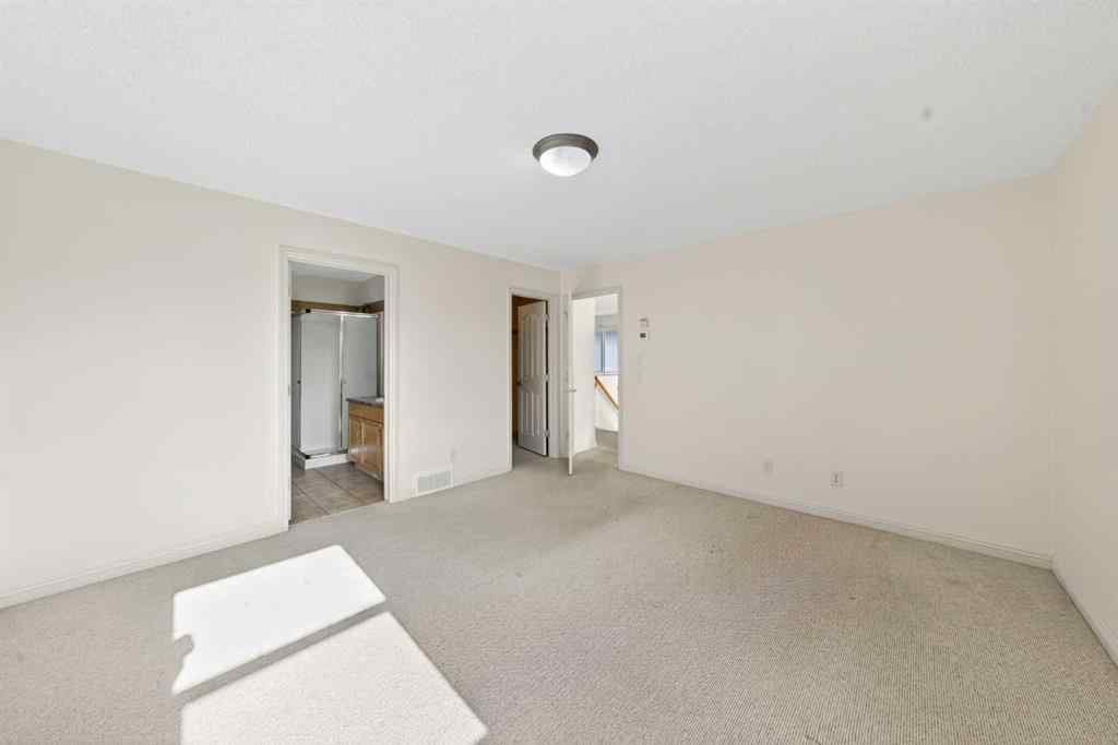 MLS® A2240997 - 320 Everbrook Way SW in Evergreen Calgary, Residential