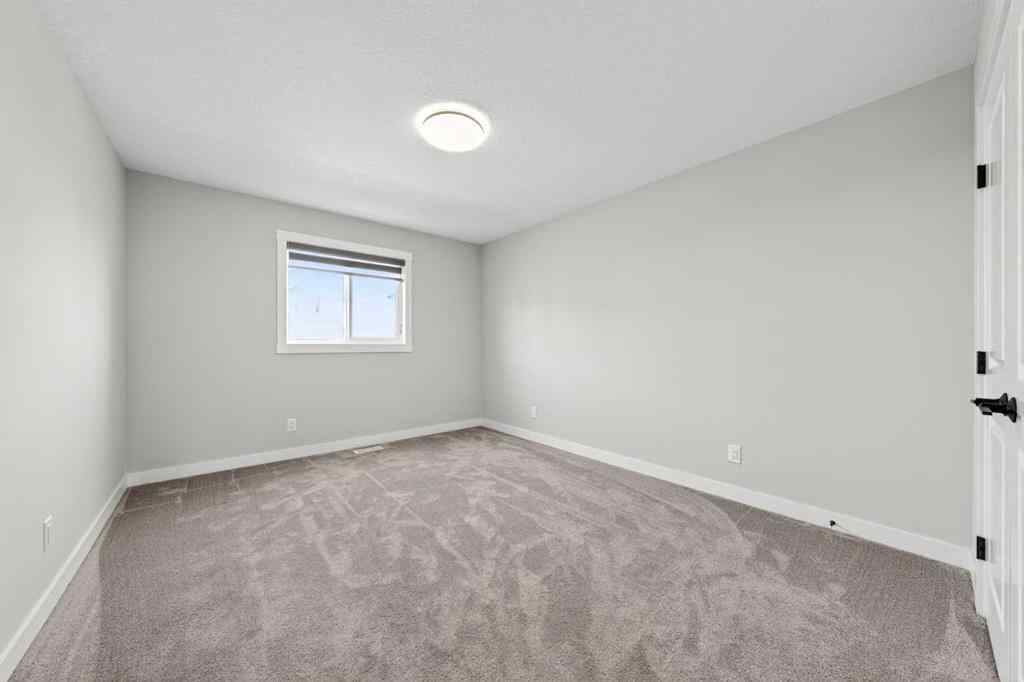 MLS® A2241004 - 61 Calhoun Crescent NE in Livingston Calgary, Residential