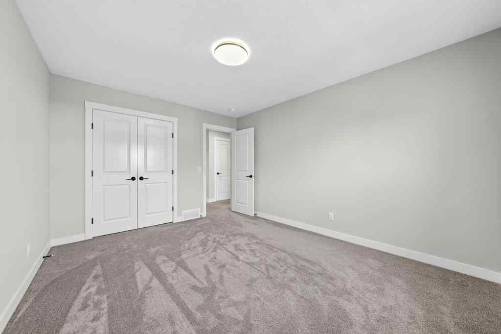 MLS® A2241004 - 61 Calhoun Crescent NE in Livingston Calgary, Residential