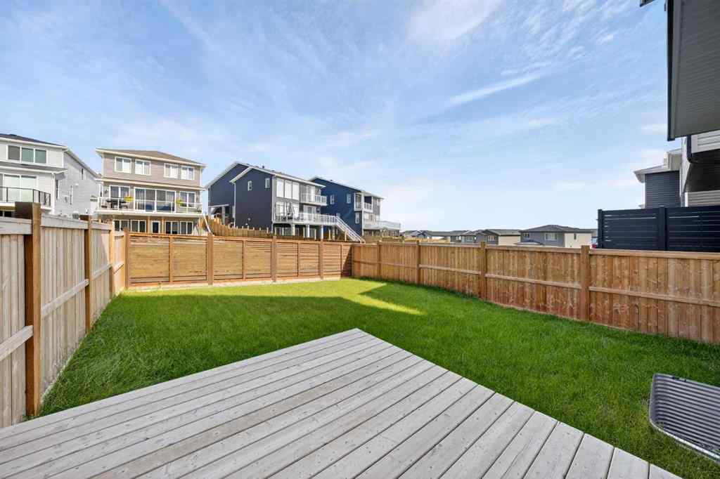 MLS® A2241004 - 61 Calhoun Crescent NE in Livingston Calgary, Residential