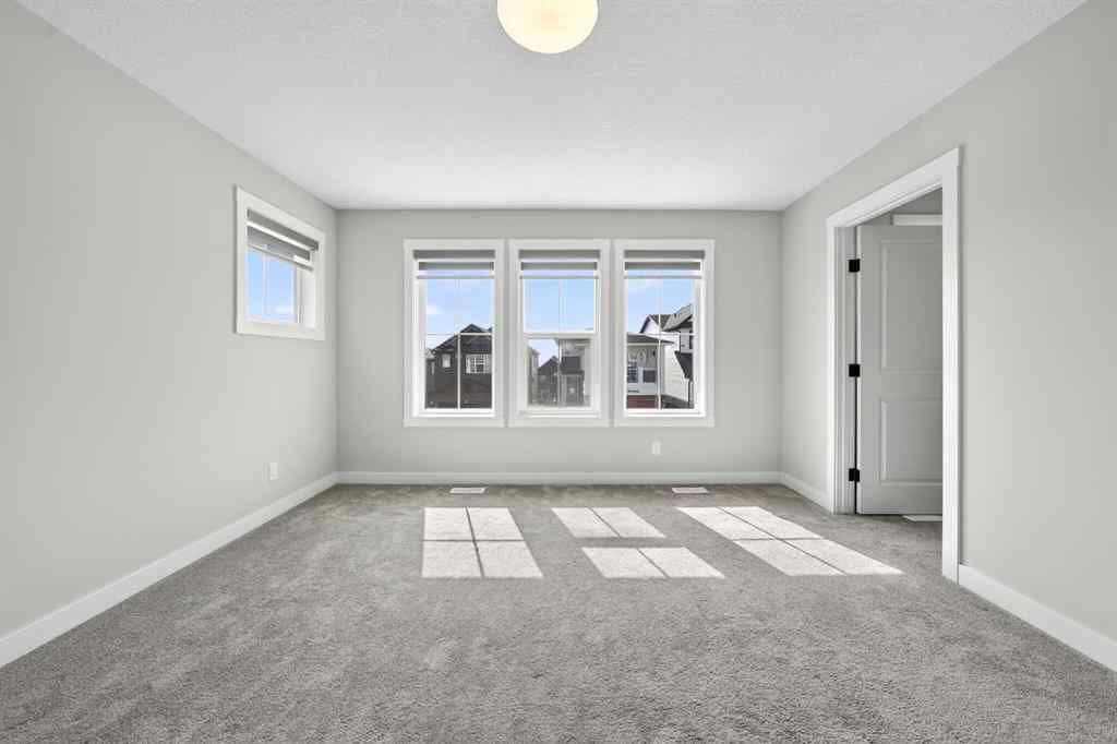 MLS® A2241004 - 61 Calhoun Crescent NE in Livingston Calgary, Residential