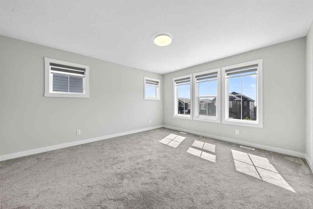 MLS® A2241004 - 61 Calhoun Crescent NE in Livingston Calgary, Residential