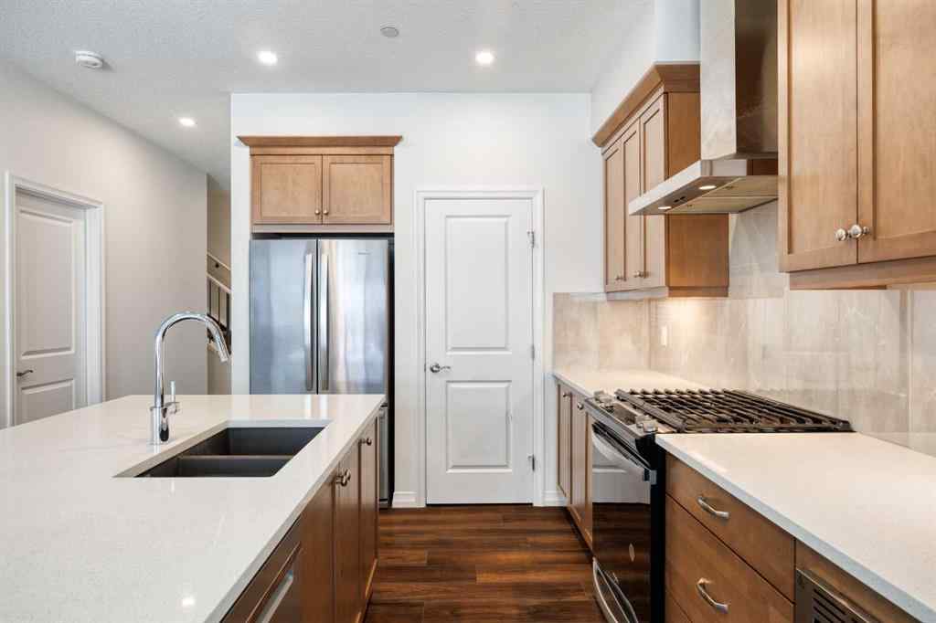 MLS® A2241015 - 244 Lucas Way NW in Livingston Calgary, Residential