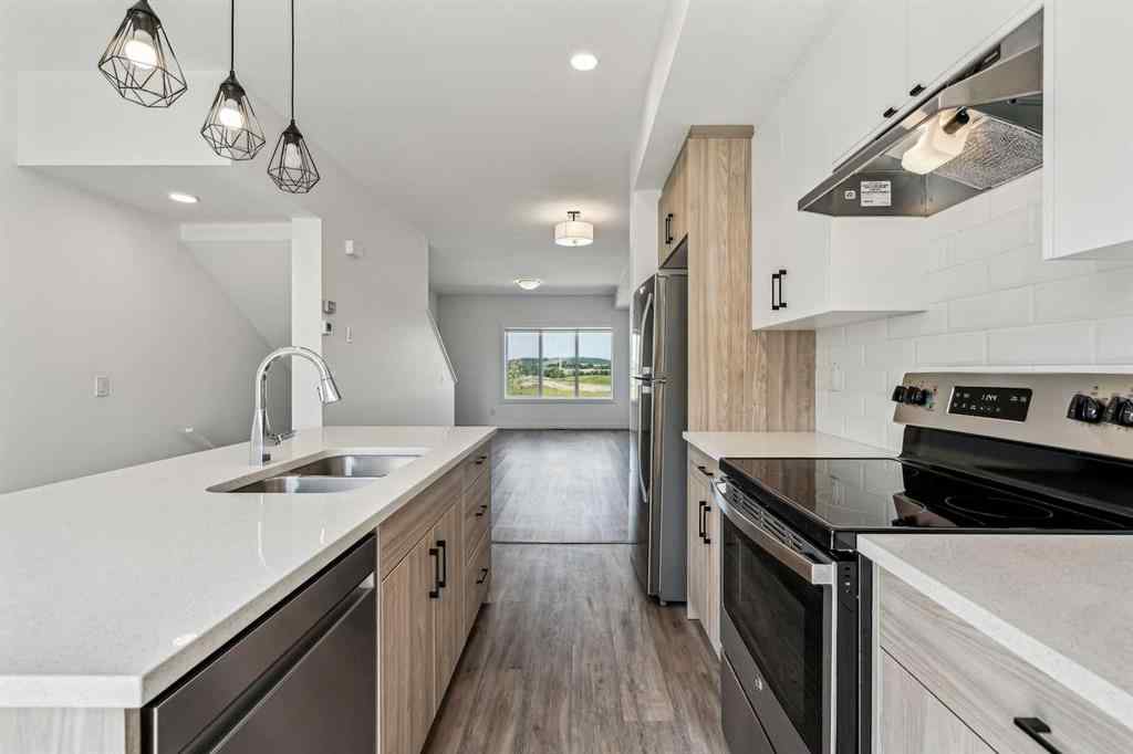 MLS® A2241036 - Unit #1504 24 Rivercrest Drive  in Rivercrest Cochrane, Residential