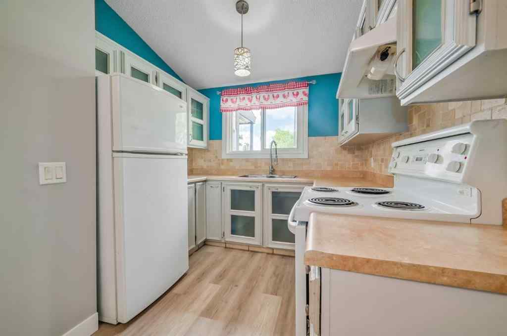 MLS® A2241068 - 1426 Ranchlands Way NW in Ranchlands Calgary, Residential
