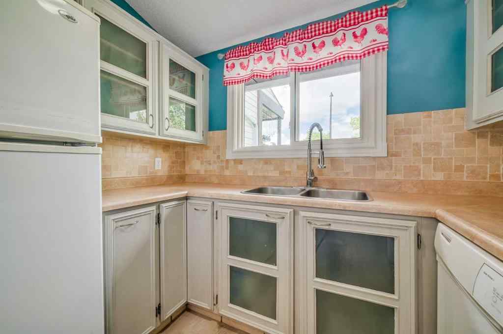 MLS® A2241068 - 1426 Ranchlands Way NW in Ranchlands Calgary, Residential