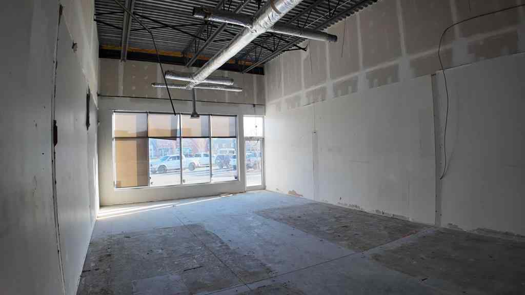 MLS® A2241088 - Unit #102 288 Kinniburgh Boulevard  in Kinniburgh North Chestermere, Commercial