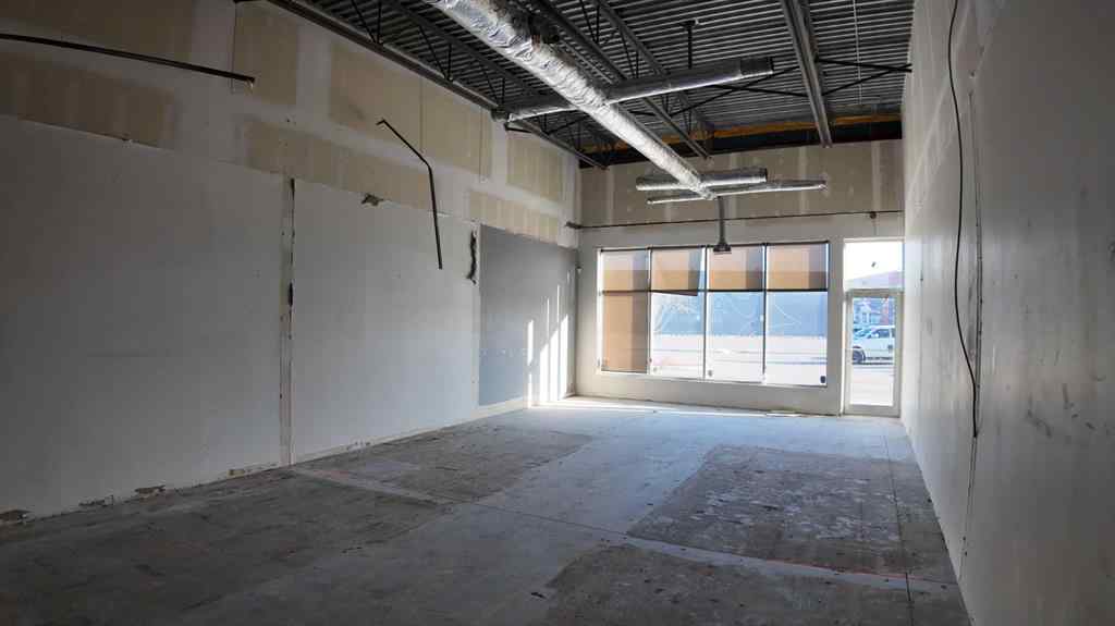 MLS® A2241088 - Unit #102 288 Kinniburgh Boulevard  in Kinniburgh North Chestermere, Commercial