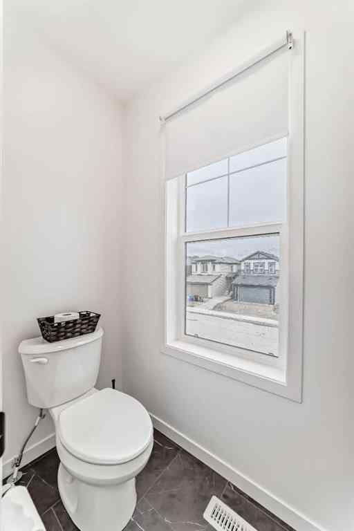 MLS® A2241108 - 171 Hotchkiss Manor SE in Hotchkiss Calgary, Residential