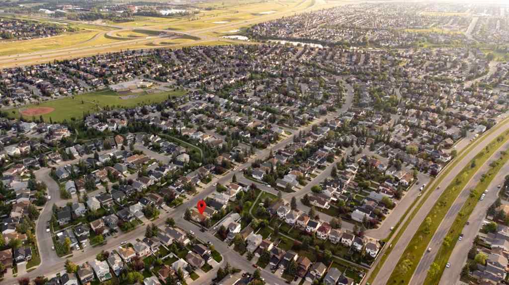 MLS® A2241112 - 106 Somerset Drive SW in Somerset Calgary, Residential