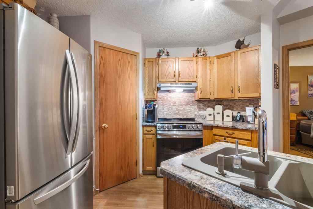 MLS® A2241112 - 106 Somerset Drive SW in Somerset Calgary, Residential