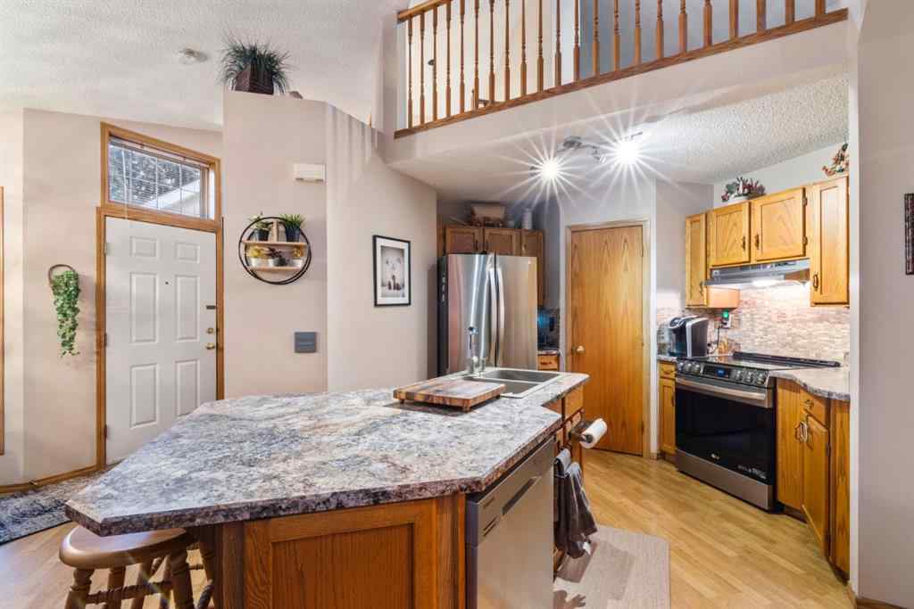 MLS® A2241112 - 106 Somerset Drive SW in Somerset Calgary, Residential