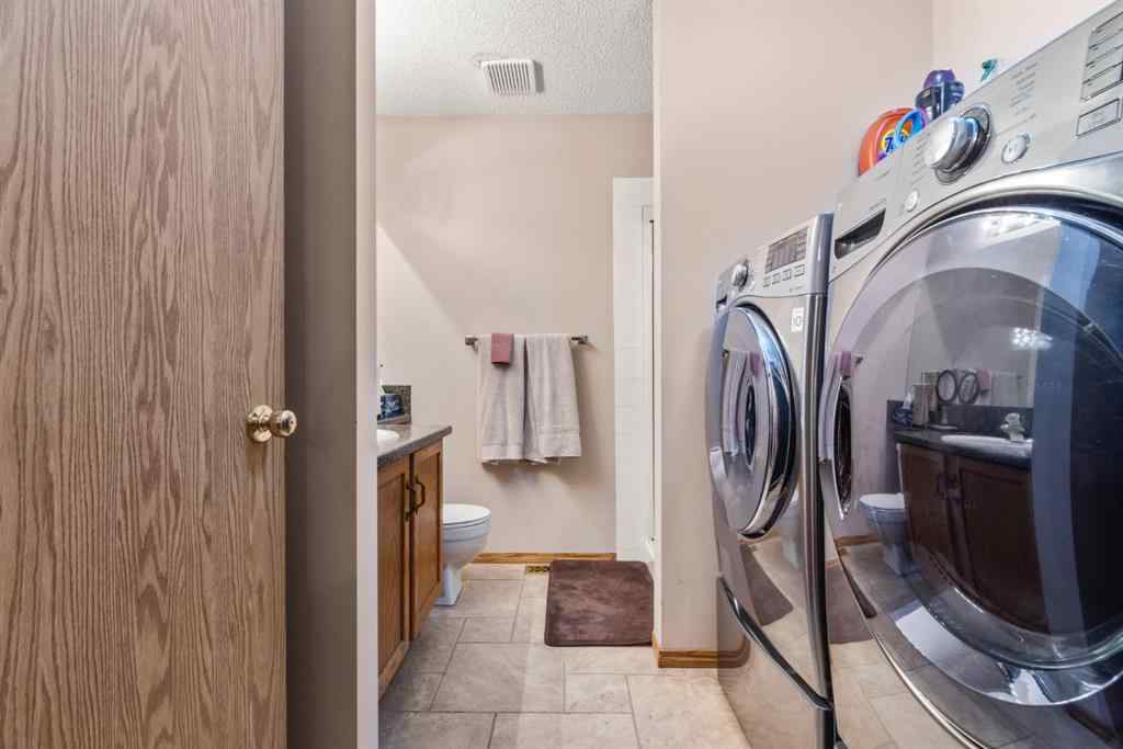 MLS® A2241112 - 106 Somerset Drive SW in Somerset Calgary, Residential