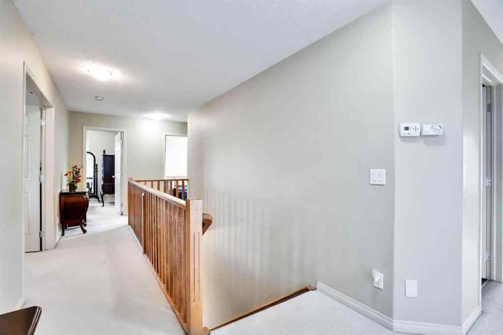 MLS® A2241148 - 28 Elmont Mews SW in Springbank Hill Calgary, Residential