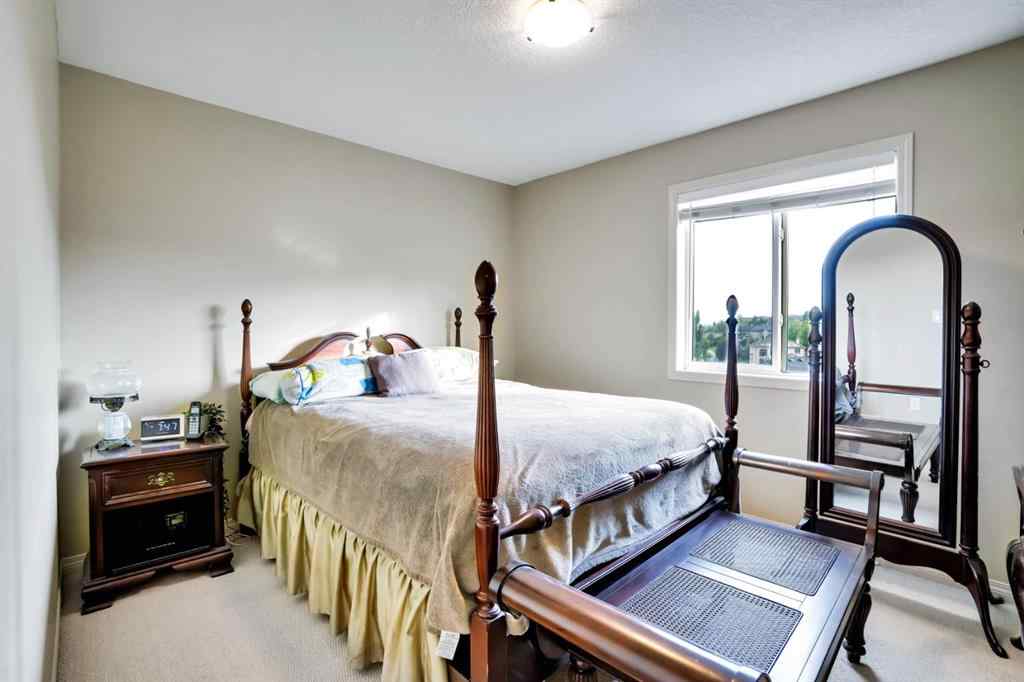 MLS® A2241148 - 28 Elmont Mews SW in Springbank Hill Calgary, Residential