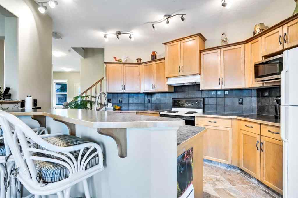 MLS® A2241148 - 28 Elmont Mews SW in Springbank Hill Calgary, Residential