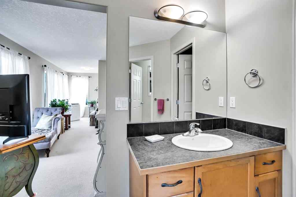 MLS® A2241148 - 28 Elmont Mews SW in Springbank Hill Calgary, Residential