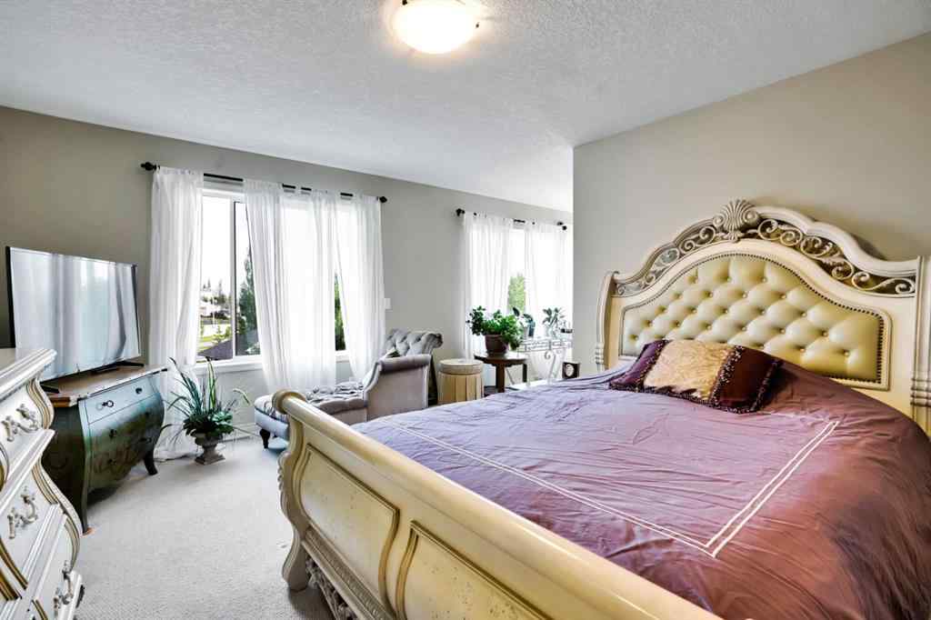 MLS® A2241148 - 28 Elmont Mews SW in Springbank Hill Calgary, Residential