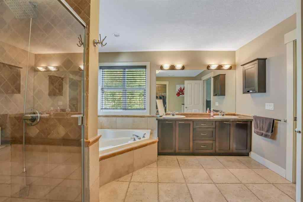 MLS® A2241206 - 105 Tremblant Place SW in Springbank Hill Calgary, Residential