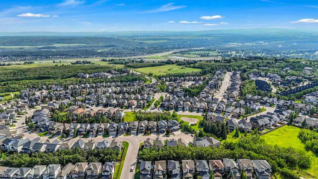 MLS® A2241206 - 105 Tremblant Place SW in Springbank Hill Calgary, Residential