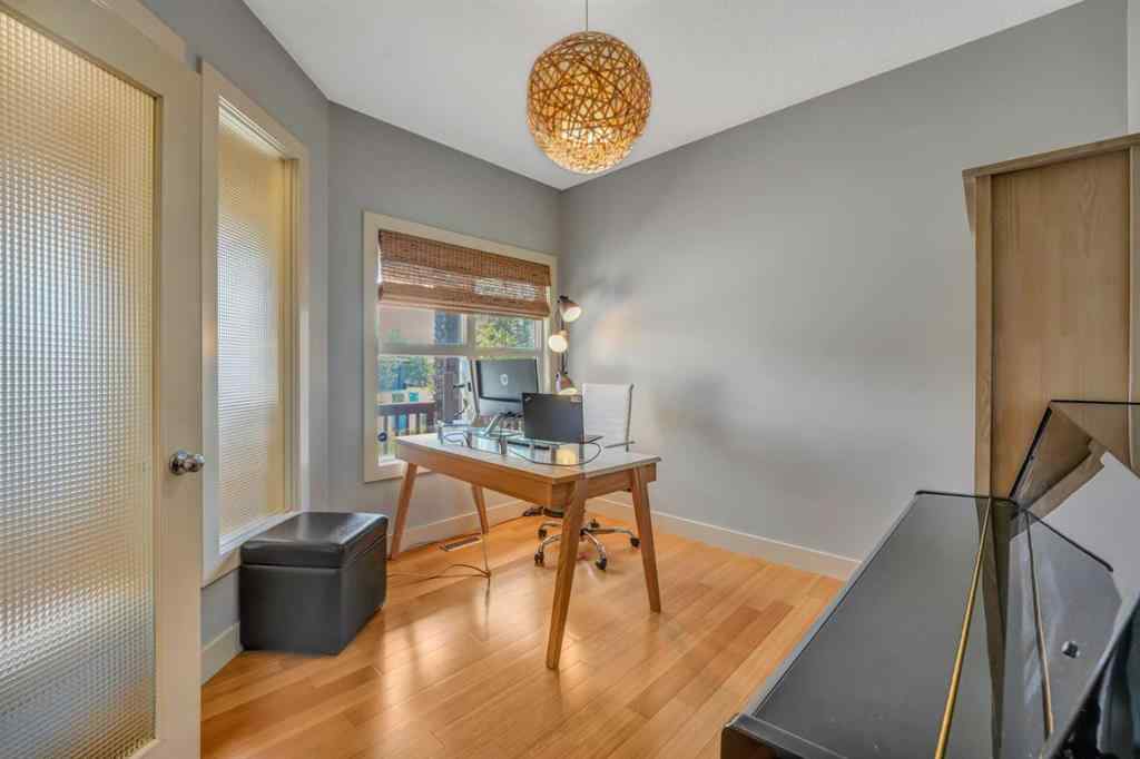 MLS® A2241206 - 105 Tremblant Place SW in Springbank Hill Calgary, Residential