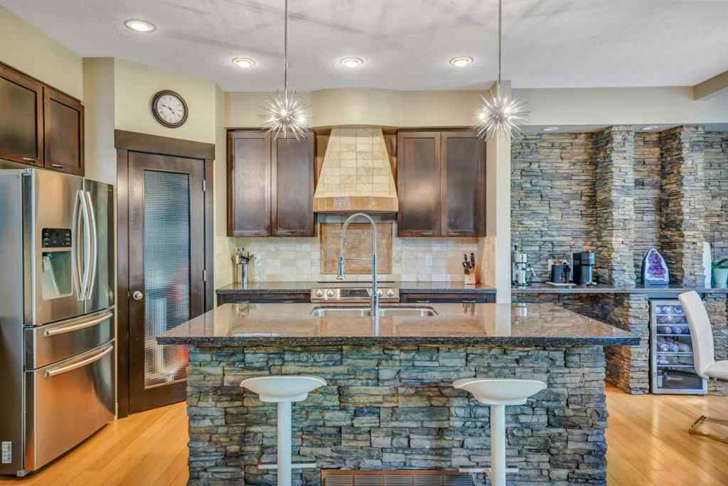 MLS® A2241206 - 105 Tremblant Place SW in Springbank Hill Calgary, Residential