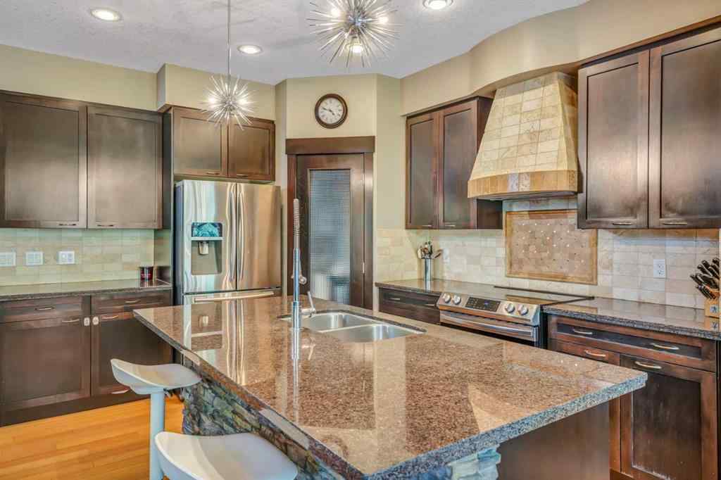 MLS® A2241206 - 105 Tremblant Place SW in Springbank Hill Calgary, Residential