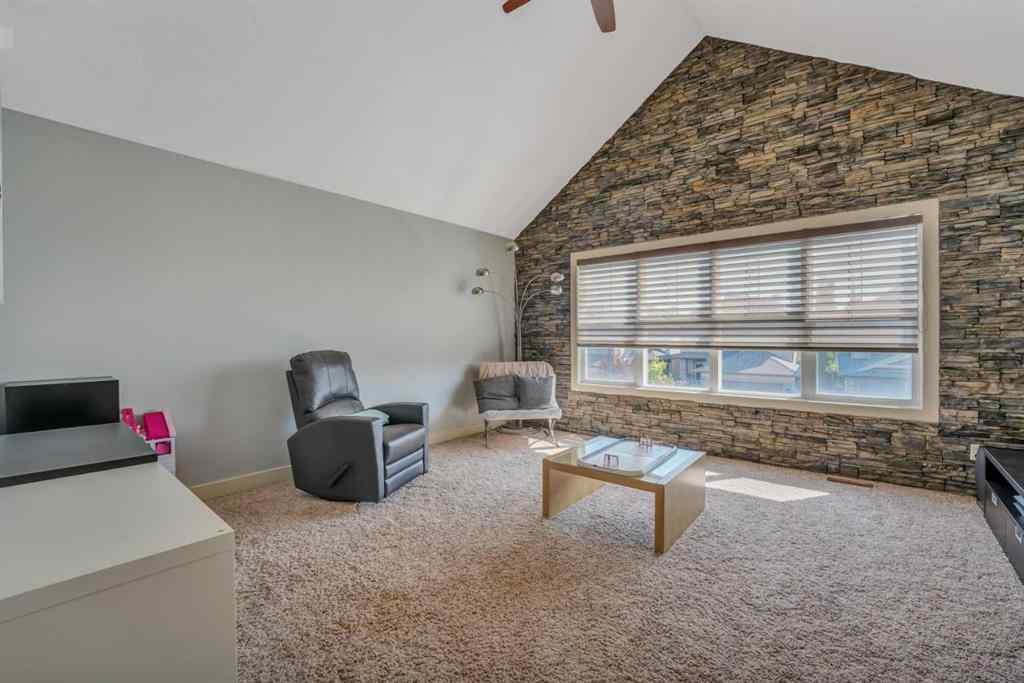 MLS® A2241206 - 105 Tremblant Place SW in Springbank Hill Calgary, Residential