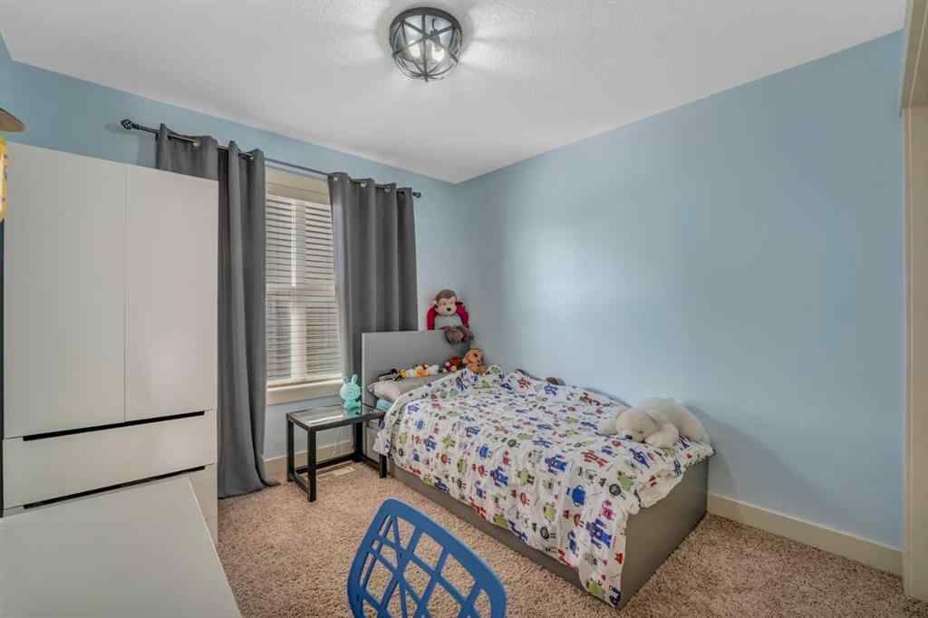 MLS® A2241206 - 105 Tremblant Place SW in Springbank Hill Calgary, Residential