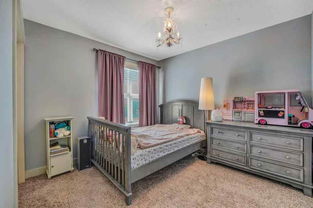 MLS® A2241206 - 105 Tremblant Place SW in Springbank Hill Calgary, Residential