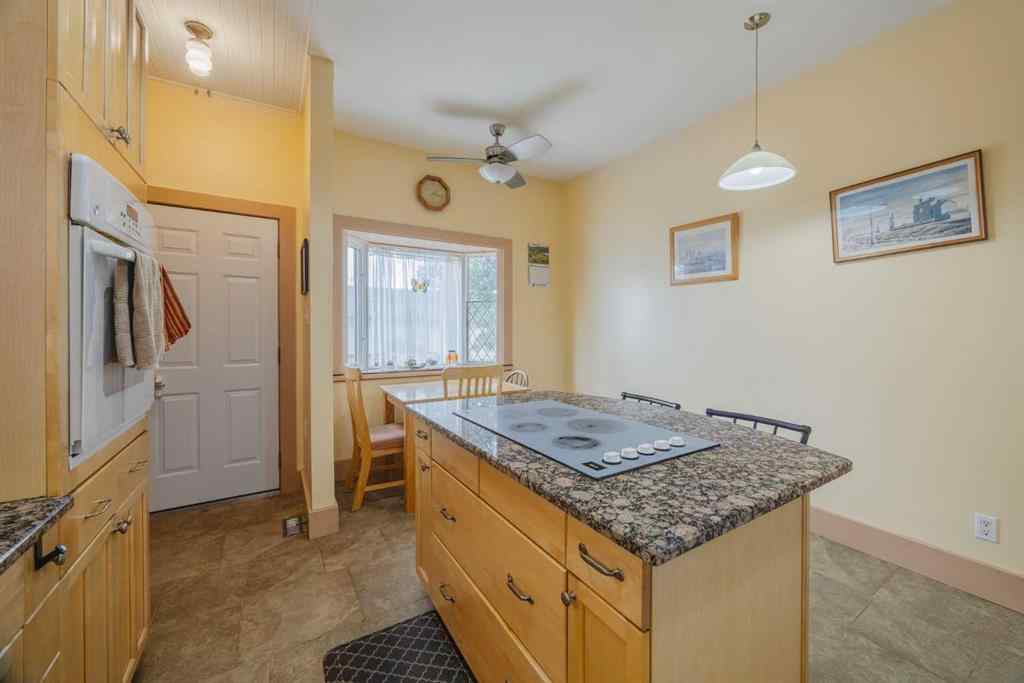 MLS® A2241221 - 15 Elma Street W in NONE Okotoks, Residential