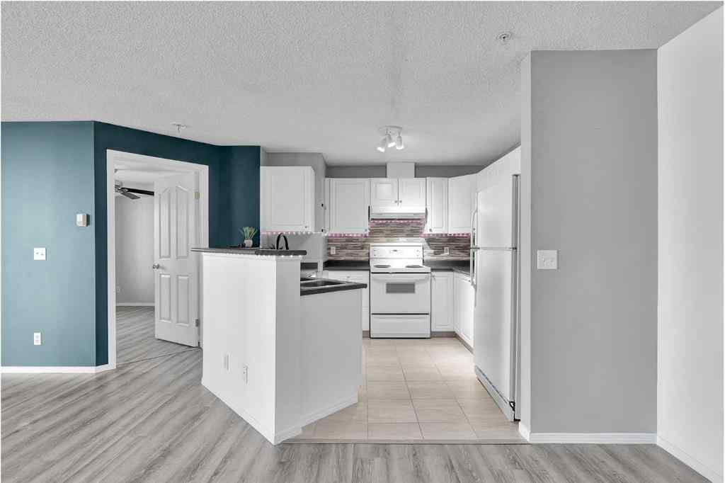 MLS® A2241260 - Unit #1212 604 8 Street SW in Downtown Airdrie, Residential