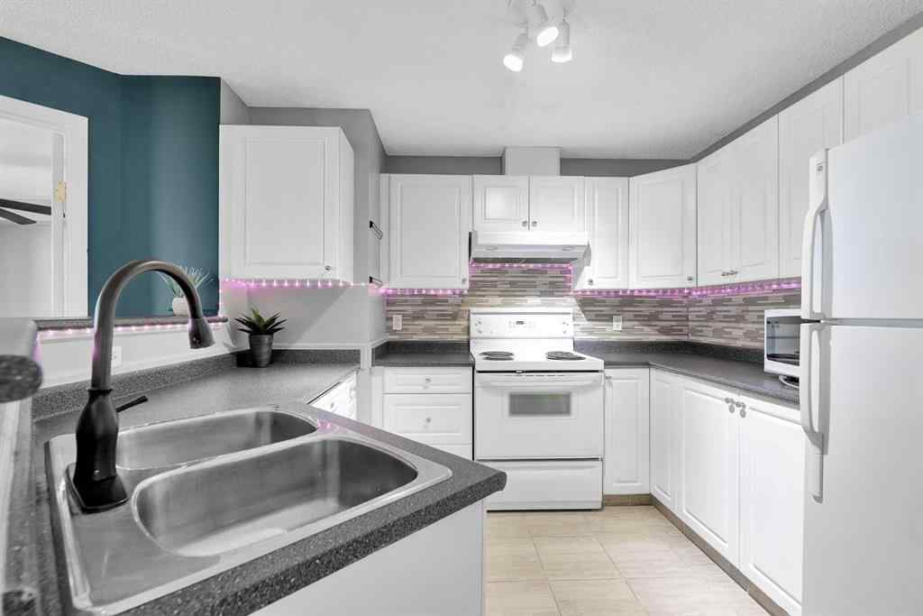 MLS® A2241260 - Unit #1212 604 8 Street SW in Downtown Airdrie, Residential