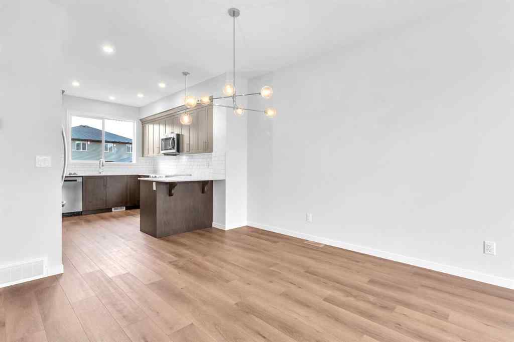 MLS® A2241305 - 70 Creekside Manor SW in Pine Creek Calgary, Residential