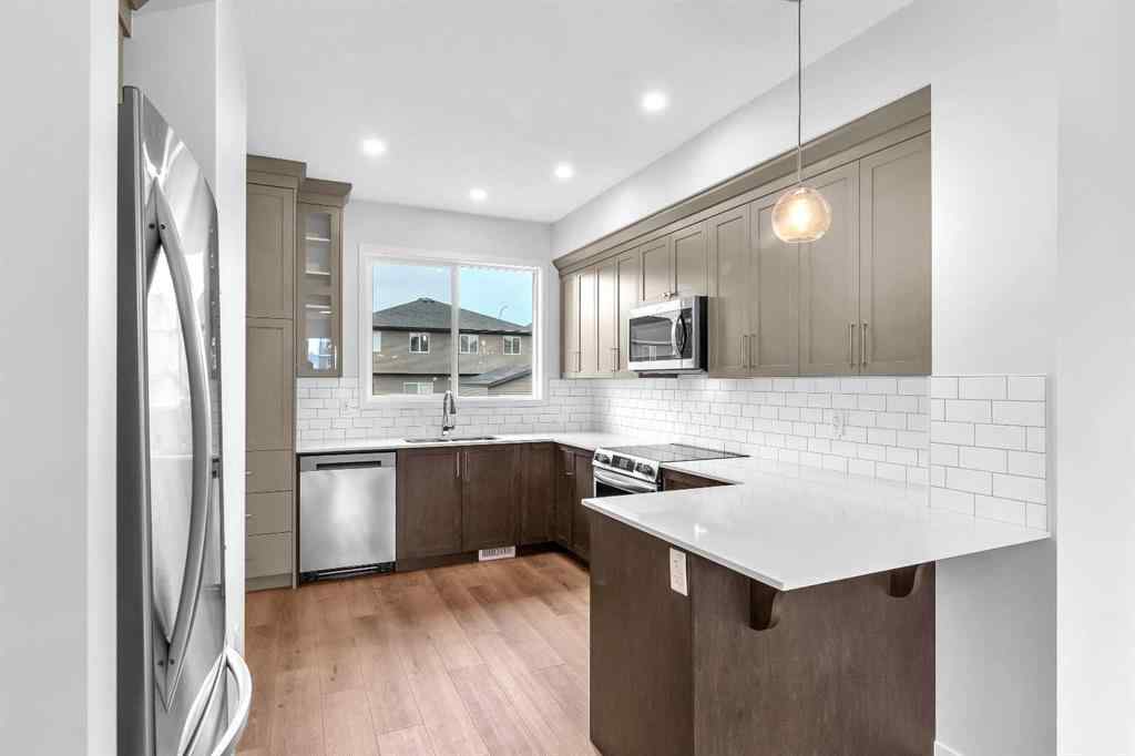 MLS® A2241305 - 70 Creekside Manor SW in Pine Creek Calgary, Residential